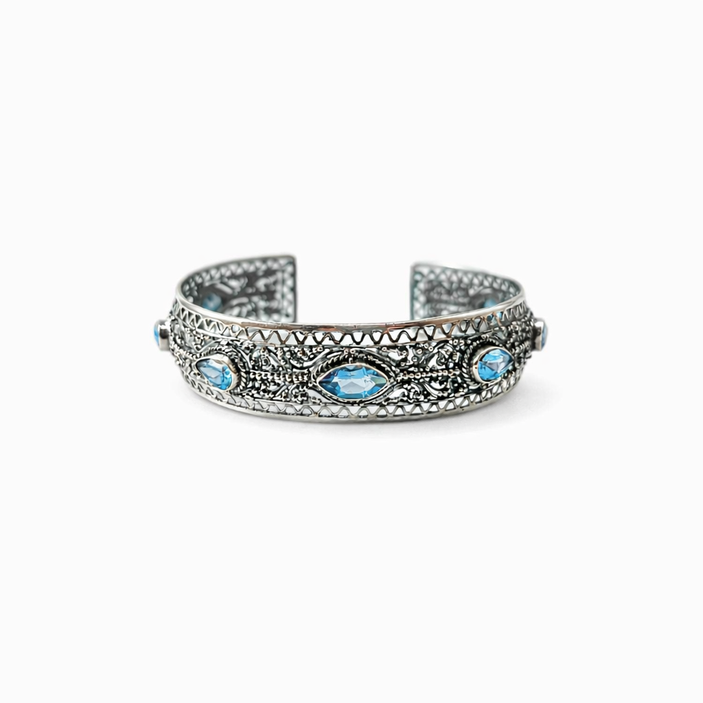 Handmade 925 sterling silver cuff bracelet with natural blue topaz stones