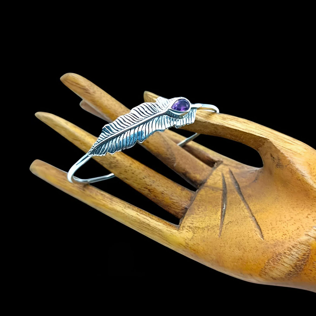 Feather-inspired silver bracelet crafted from 925 silver with natural amethyst and green agate