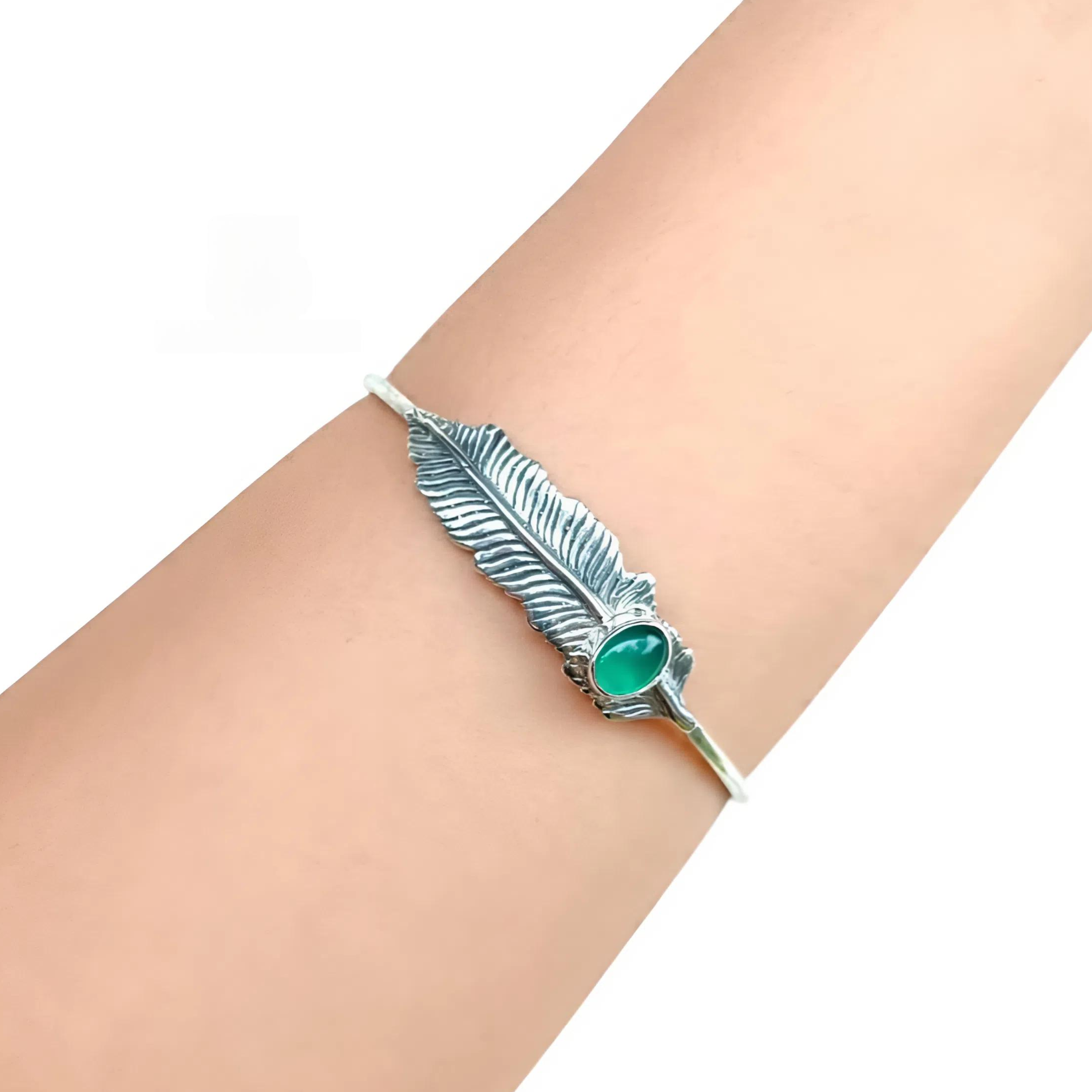 Comfortable daily wear silver bracelet with feather design and natural gemstones